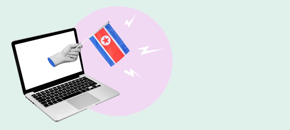 A hand coming out of a computer screen and holding a North Korean flag